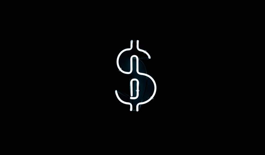 white neon dollar sign against a black background