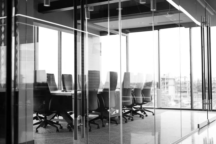 a conference room in an office on a high floor of a skyscraper