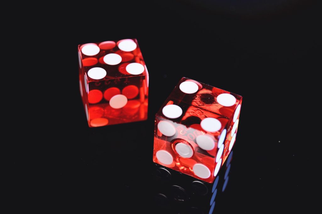 casino dice representing a class action law suit surrounding addiction to lottery games