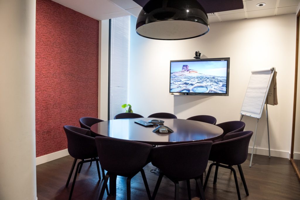 A meeting room with video conference technology