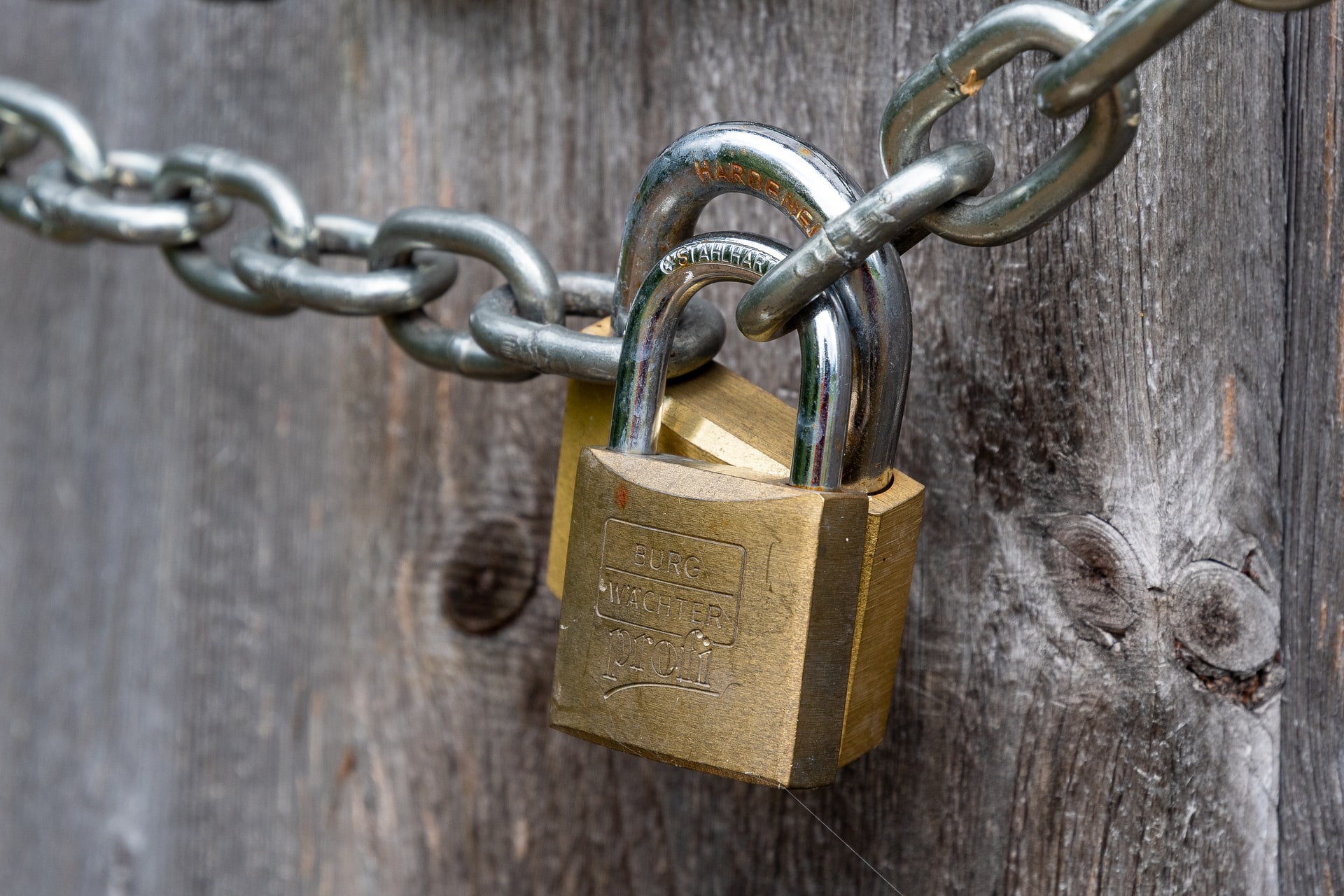 A padlocked chain, representing a commercial tenant locked out of their leased premises