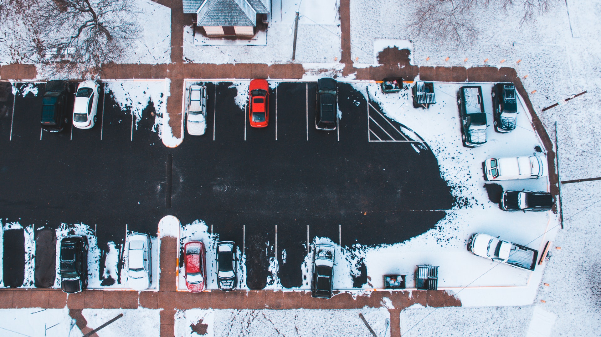 A snowy parking lot representing a case of breach of the duty of honesty in a contractual dispute