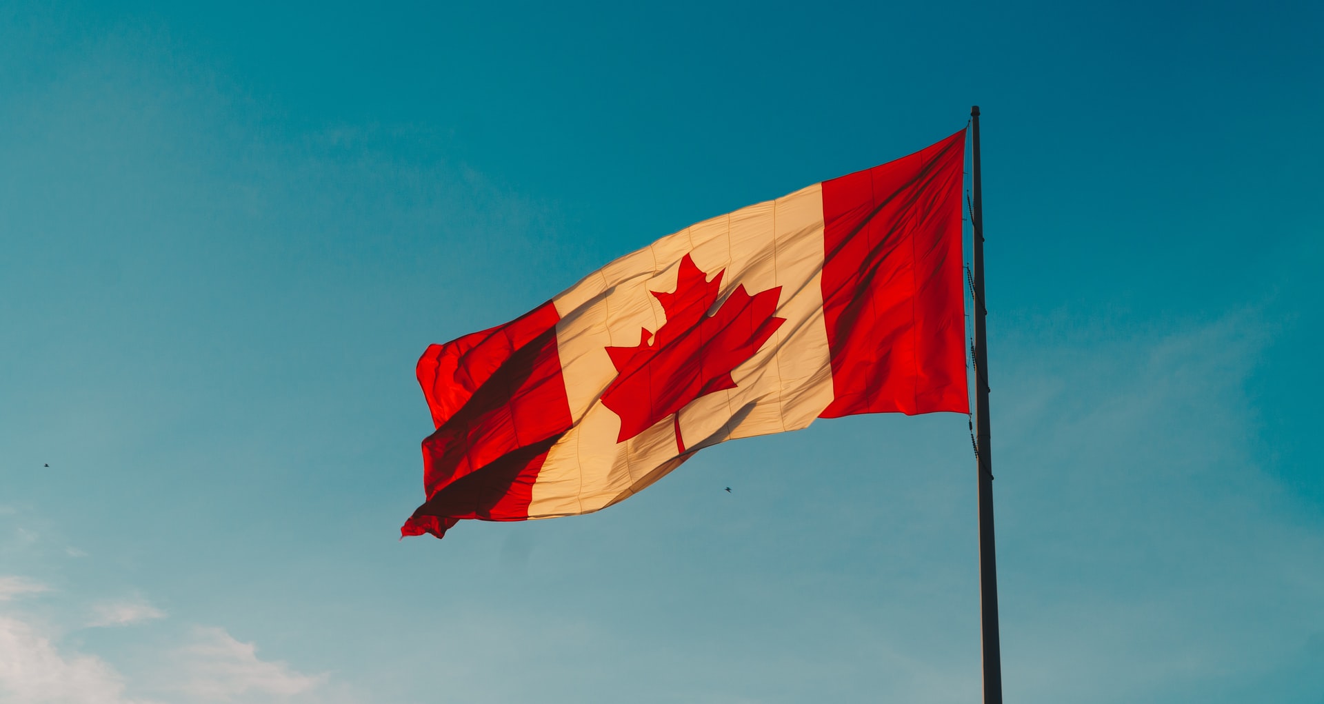 Canadian flag representing upcoming changes to Director residency requirements in Ontario
