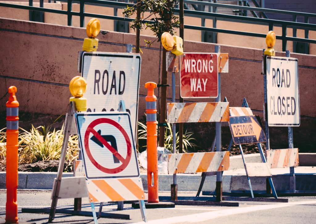Road work signs representing an SCC case providing guidance on how to interpret the wording of a release