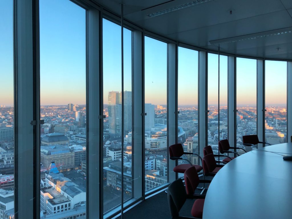 boardroom representing a shot gun clause in a share holder agreement meeting