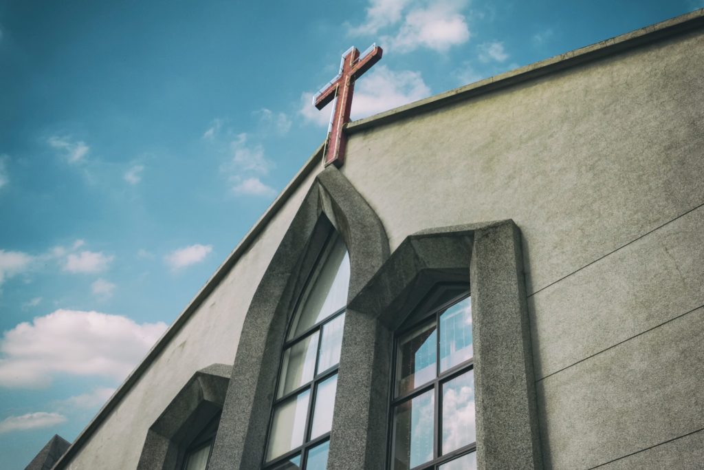 Skyward view of a church building, representing a commercial lease dispute between a landlord and prospective buyer of a church property