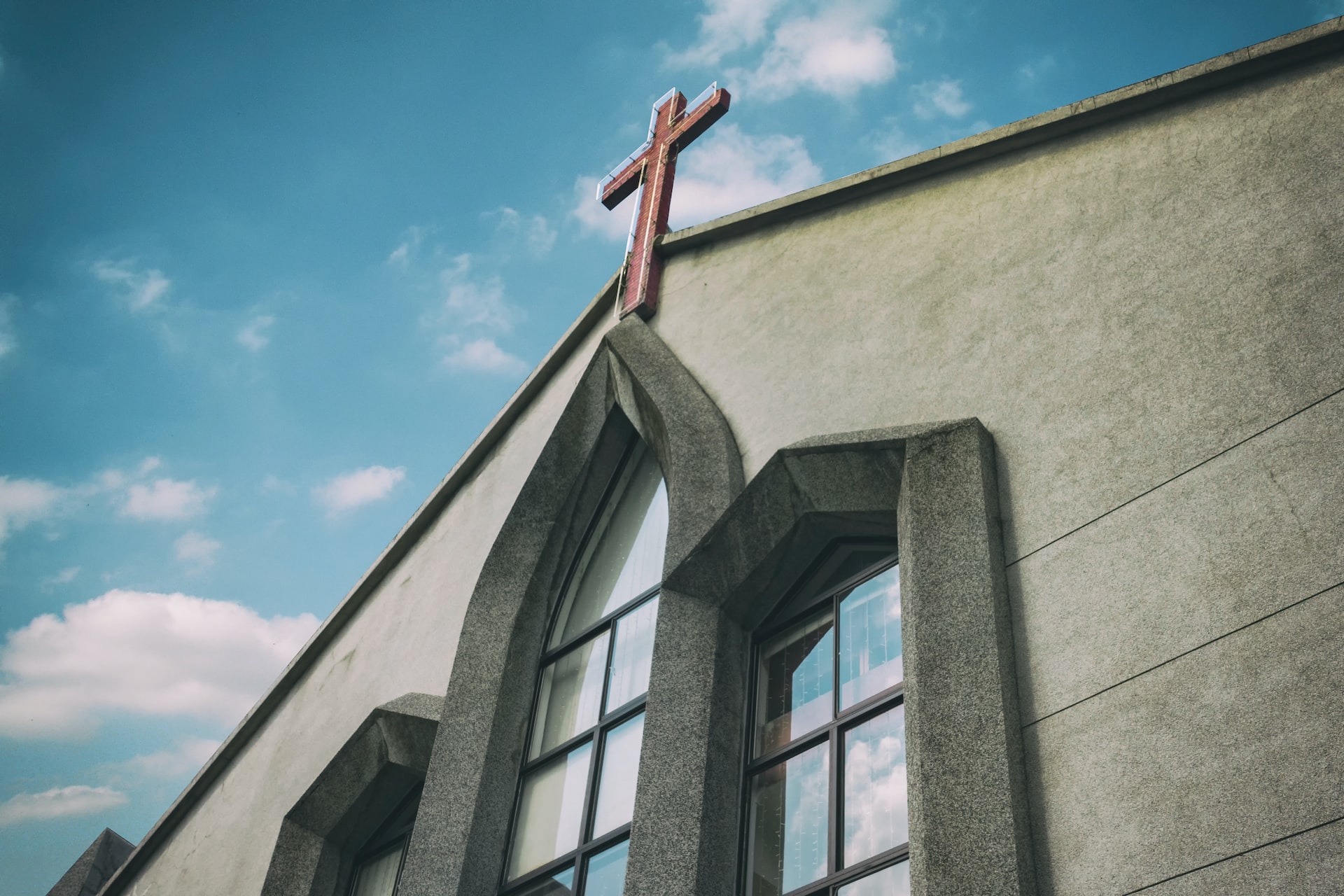 Skyward view of a church building, representing a commercial lease dispute between a landlord and prospective buyer of a church property