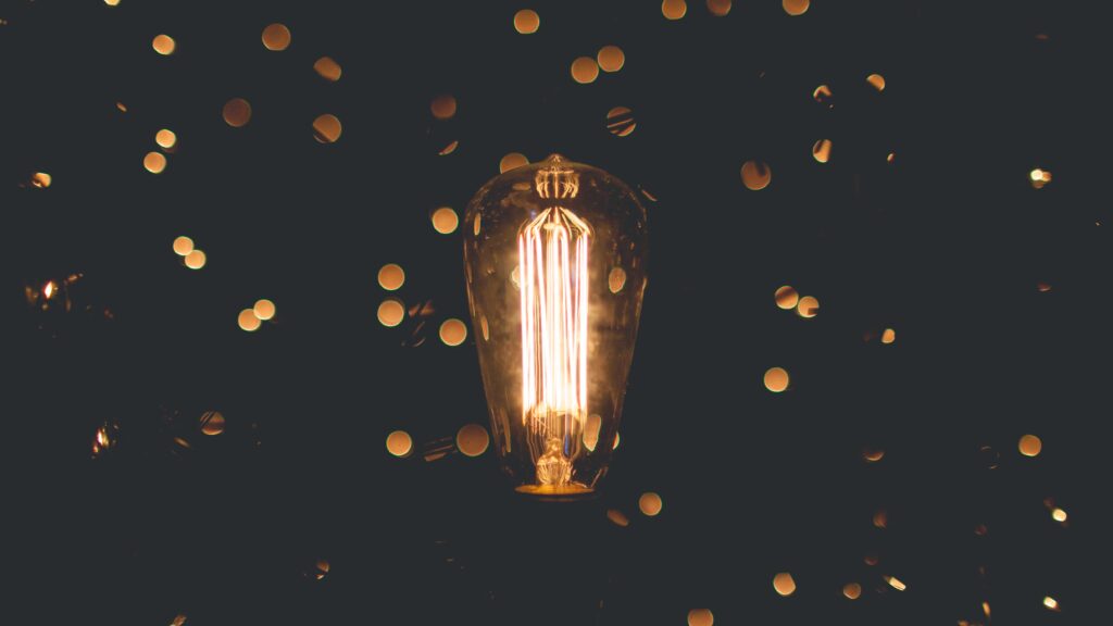 Light bulb representing criminal fraud and civil enforcement