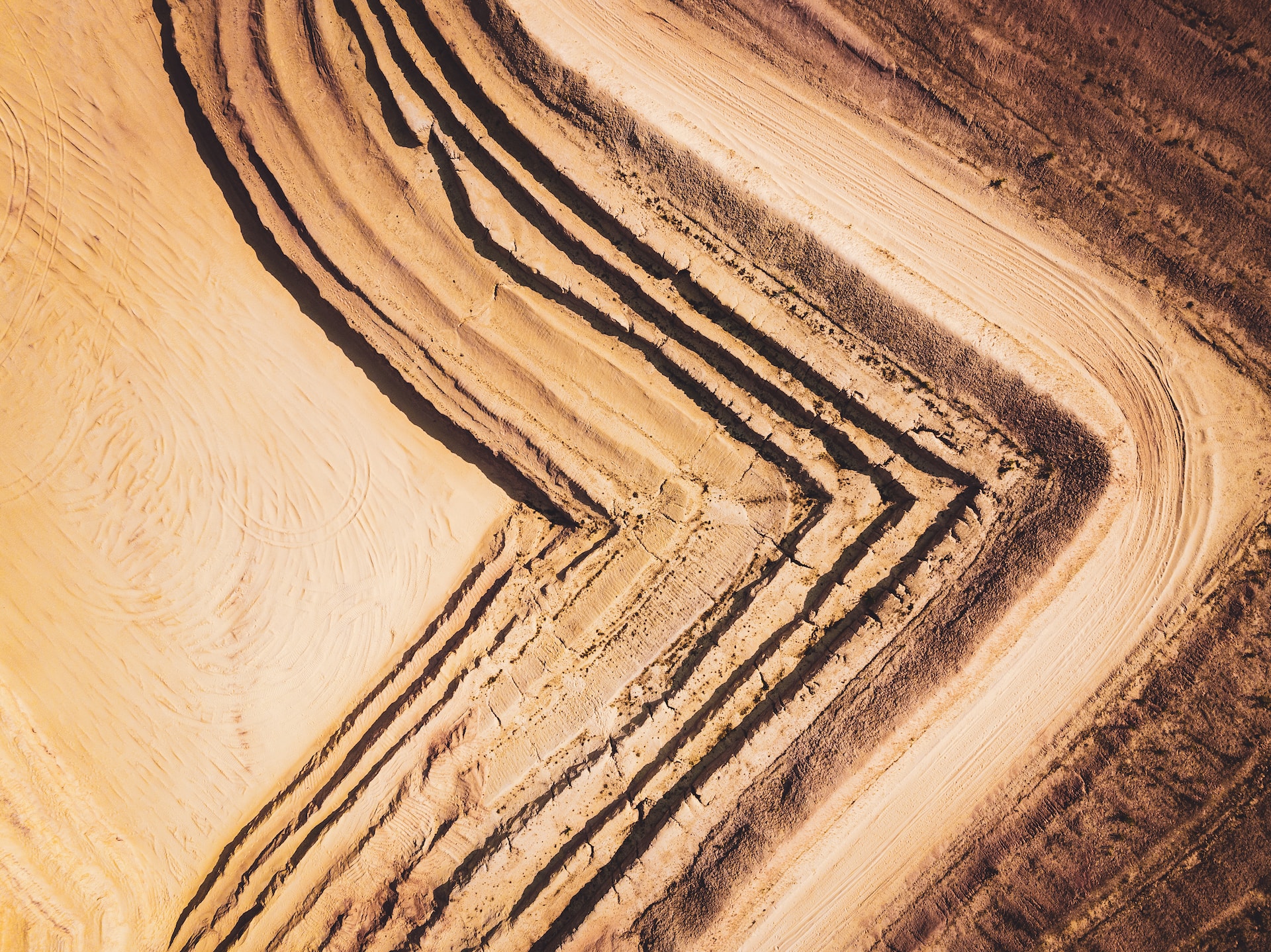 Aerial view of gravel pits, representing employee fraud in Ontario