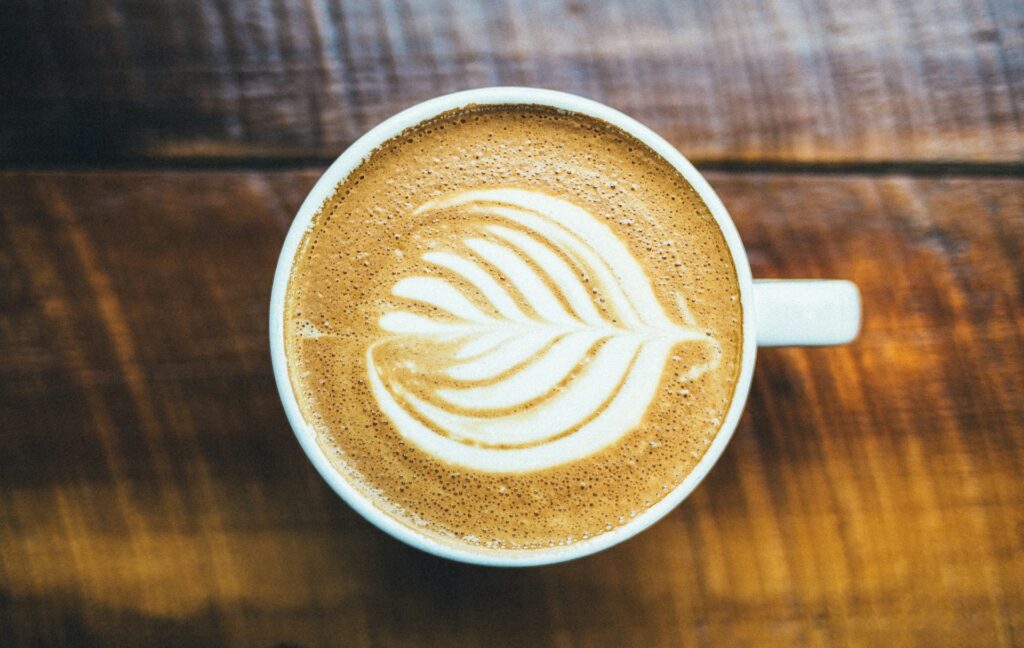 capuchino on wooden table