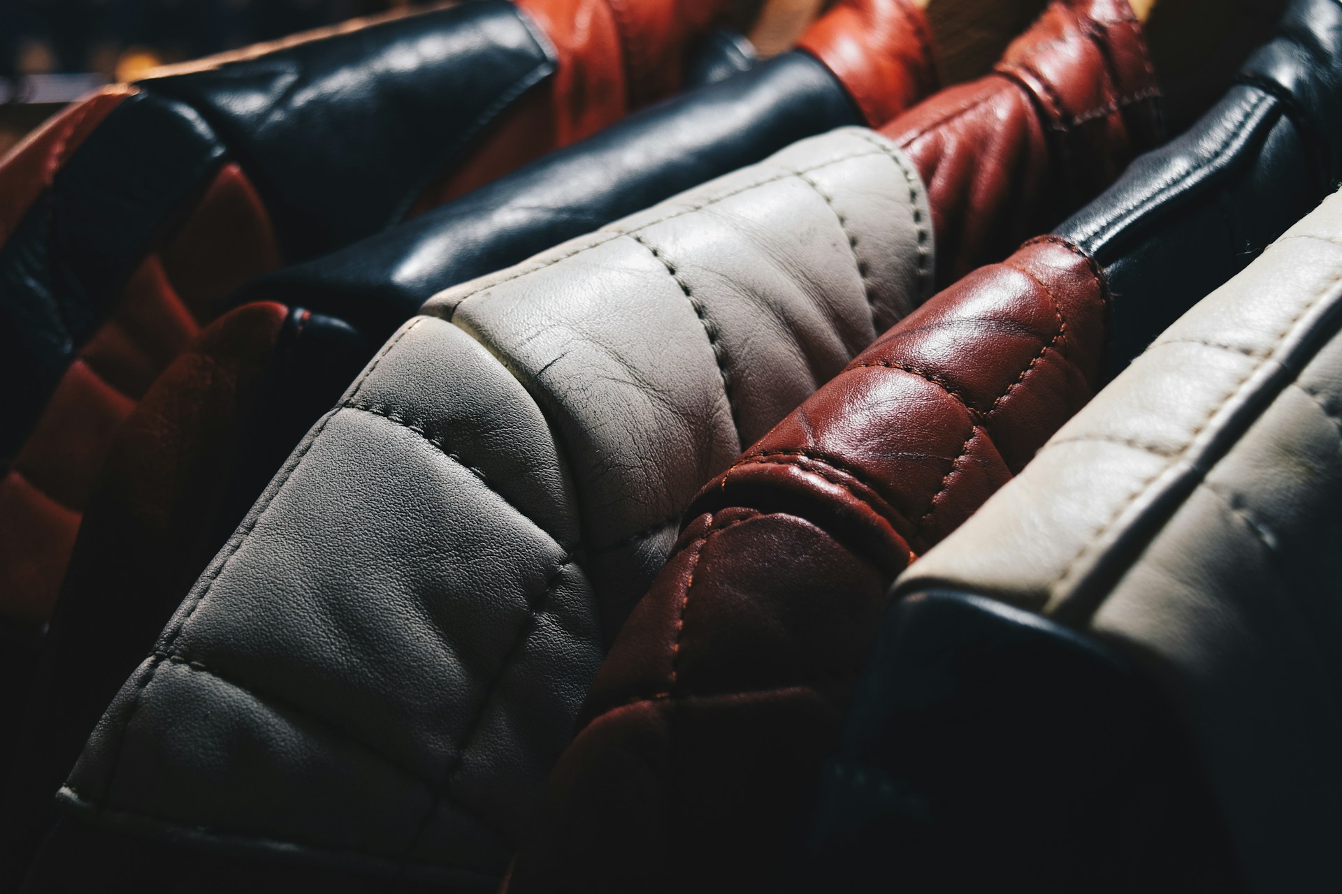 leather jackets hung in a row