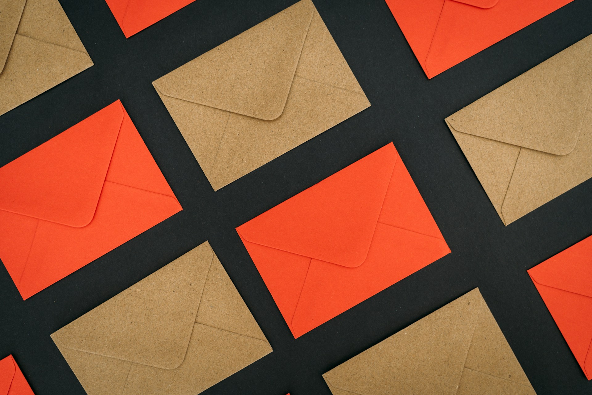 a close up of brown and orange letter envelopes