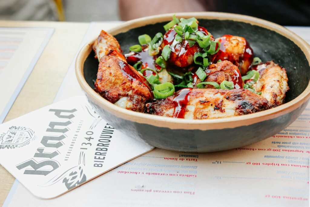 fried meat in a bowl served in a restaurant