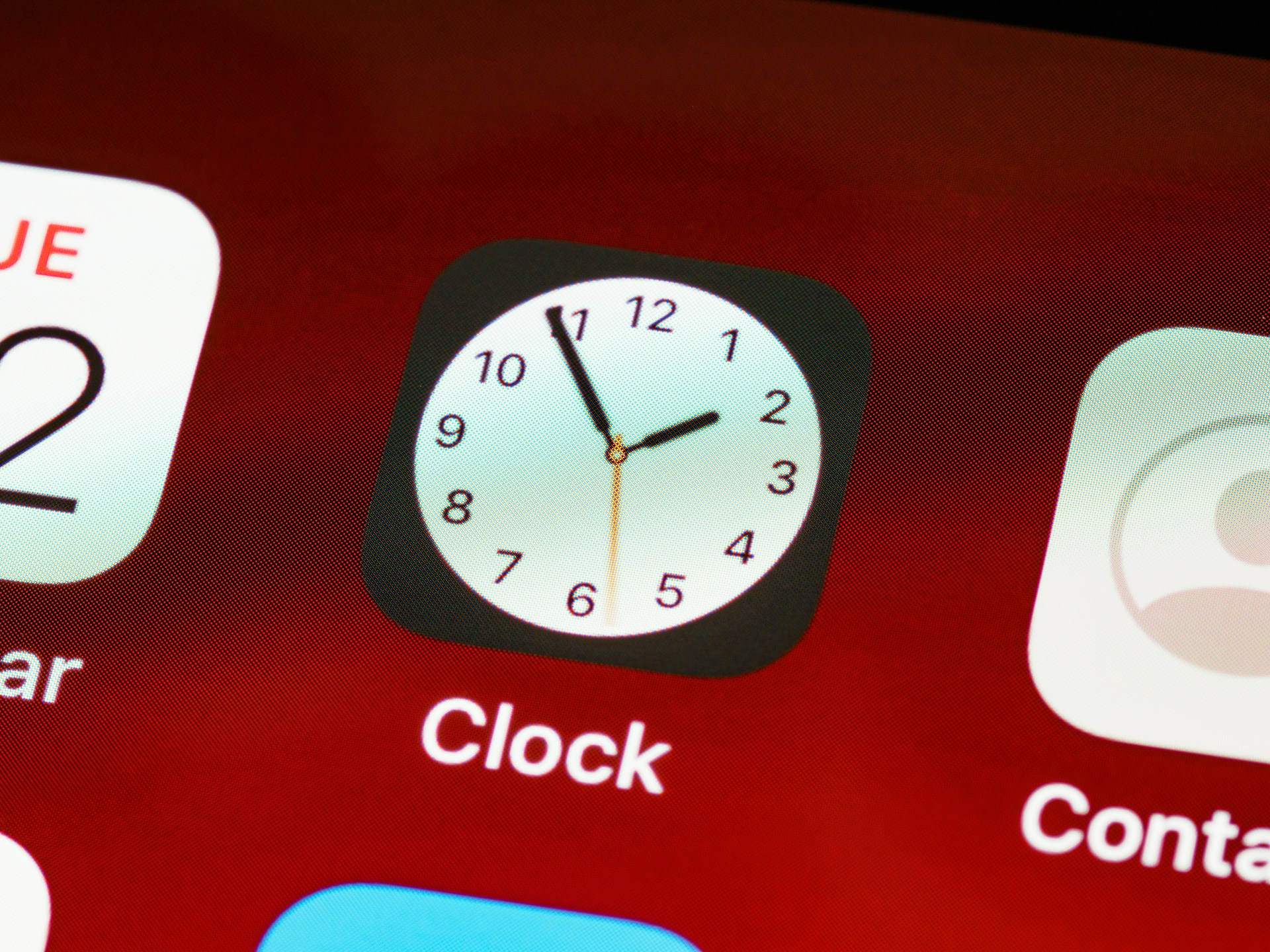 apple clock app on red background