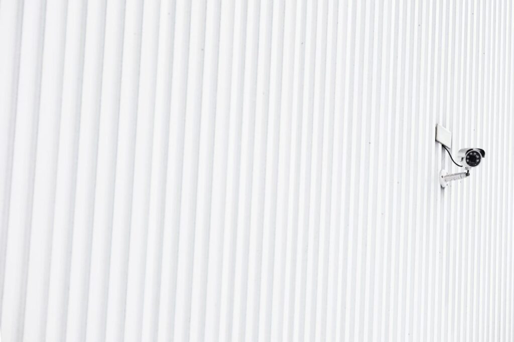 CCTV camera on white building