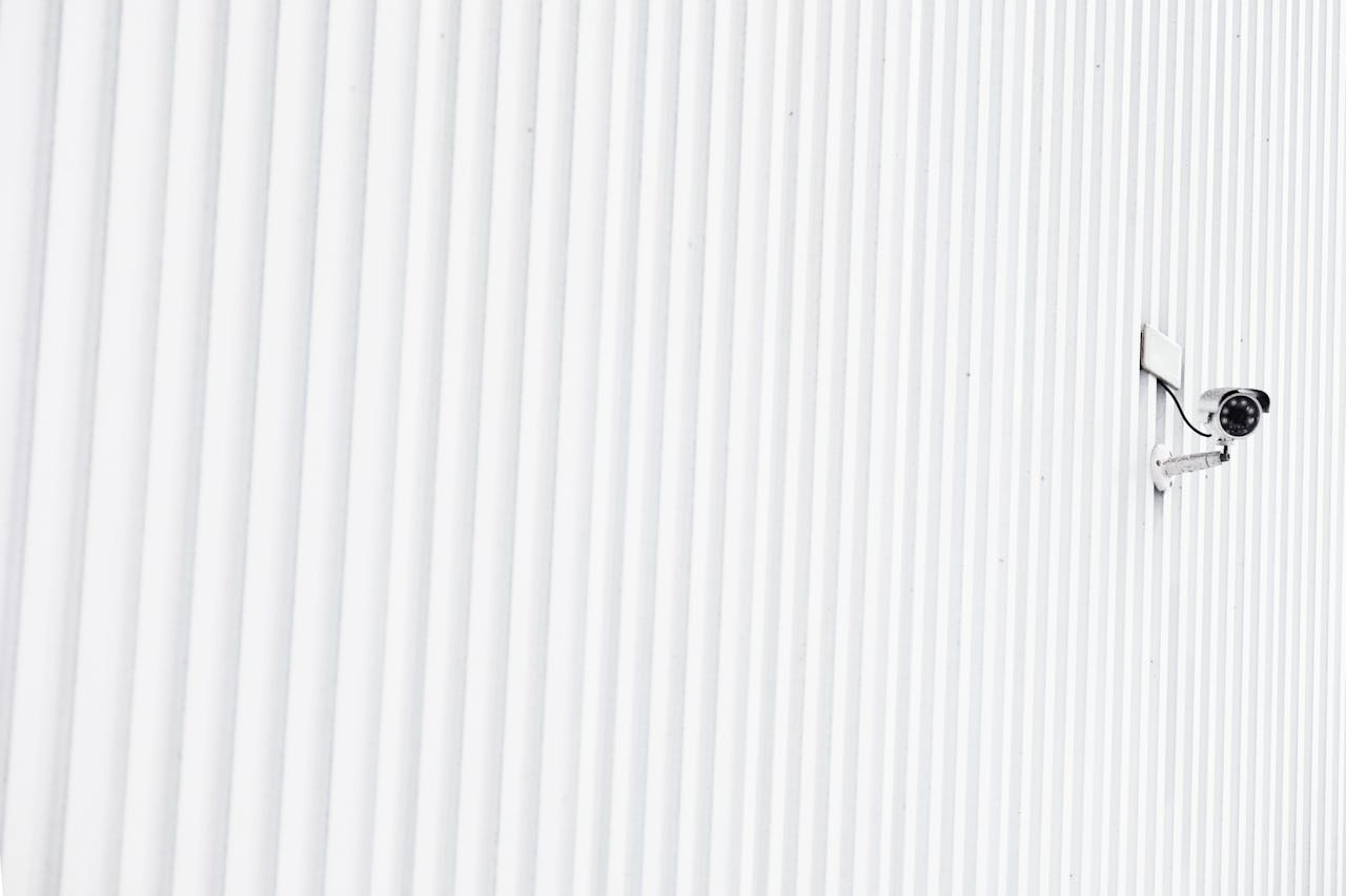 CCTV camera on white building