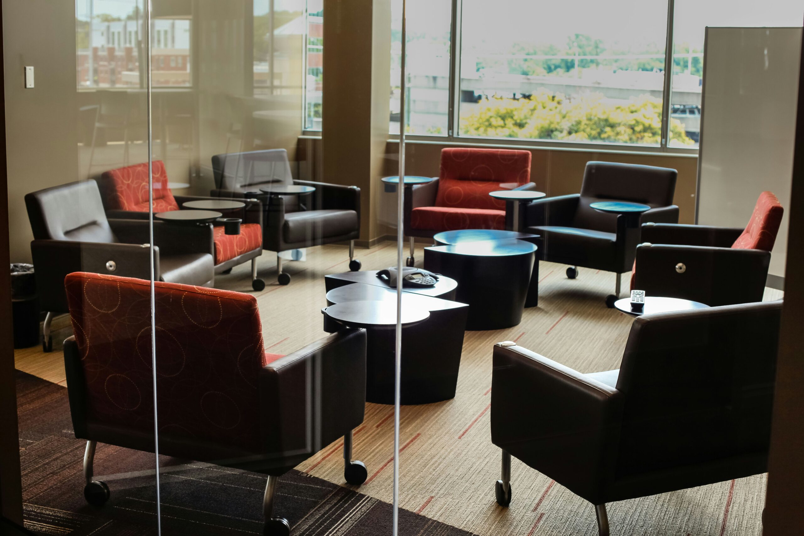 Coffee table surrounded by chairs representing complex commercial litigation in an appeal case