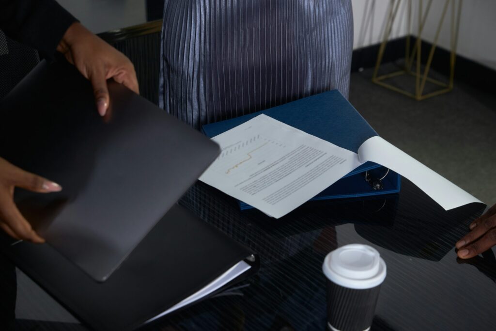 Desk with notebook and pen representing commercial real estate disputes