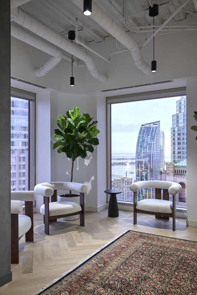 The modern waiting room in the Milosevic & Associates lobby. Milosevic & Associates is a leading business litigation and civil fraud law firm in Toronto, representing clients in complex commercial litigation matters, injunctions, professional negligence, investment loss, and commercial real estate matters.