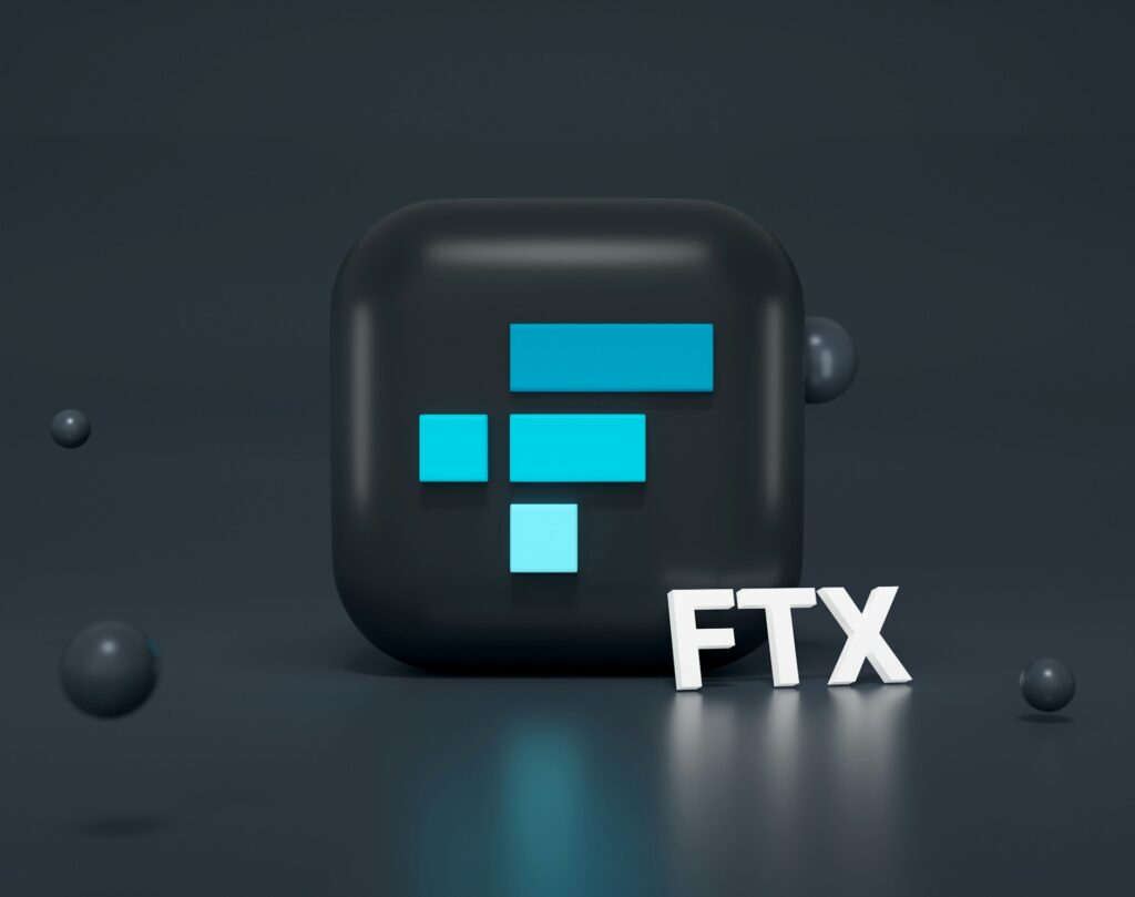 3D rendering of the FTX logo in blue on a black background, representing the FTX crypto exchange collapse and auditor negligence