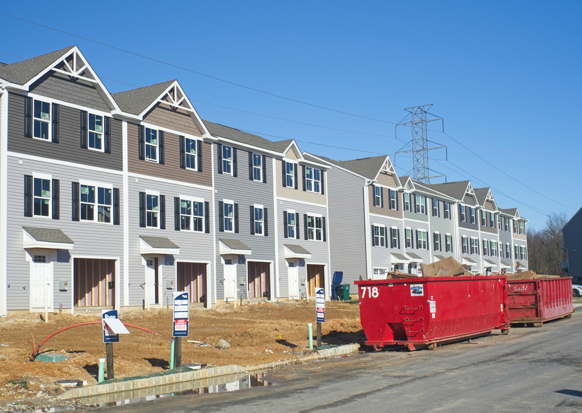 Townhouse under construction, representing real estate investor fraud.