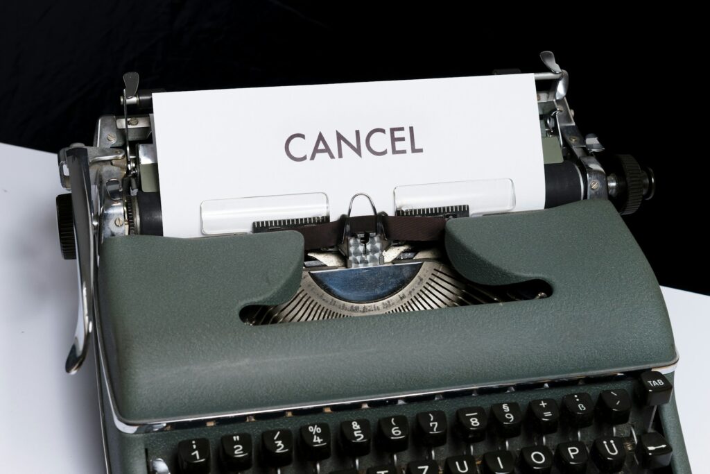 A close-up of a vintage typewriter with the word 